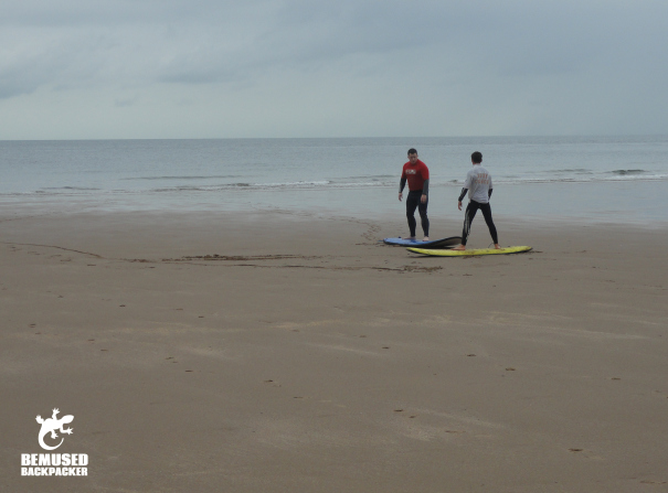 Learning to surf Caswell Bay Wales