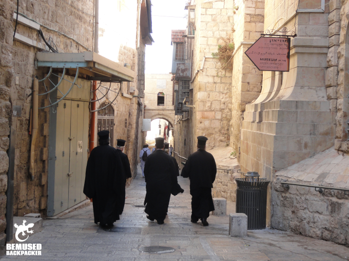 Priests walking through the old city of Jerusalem Israel