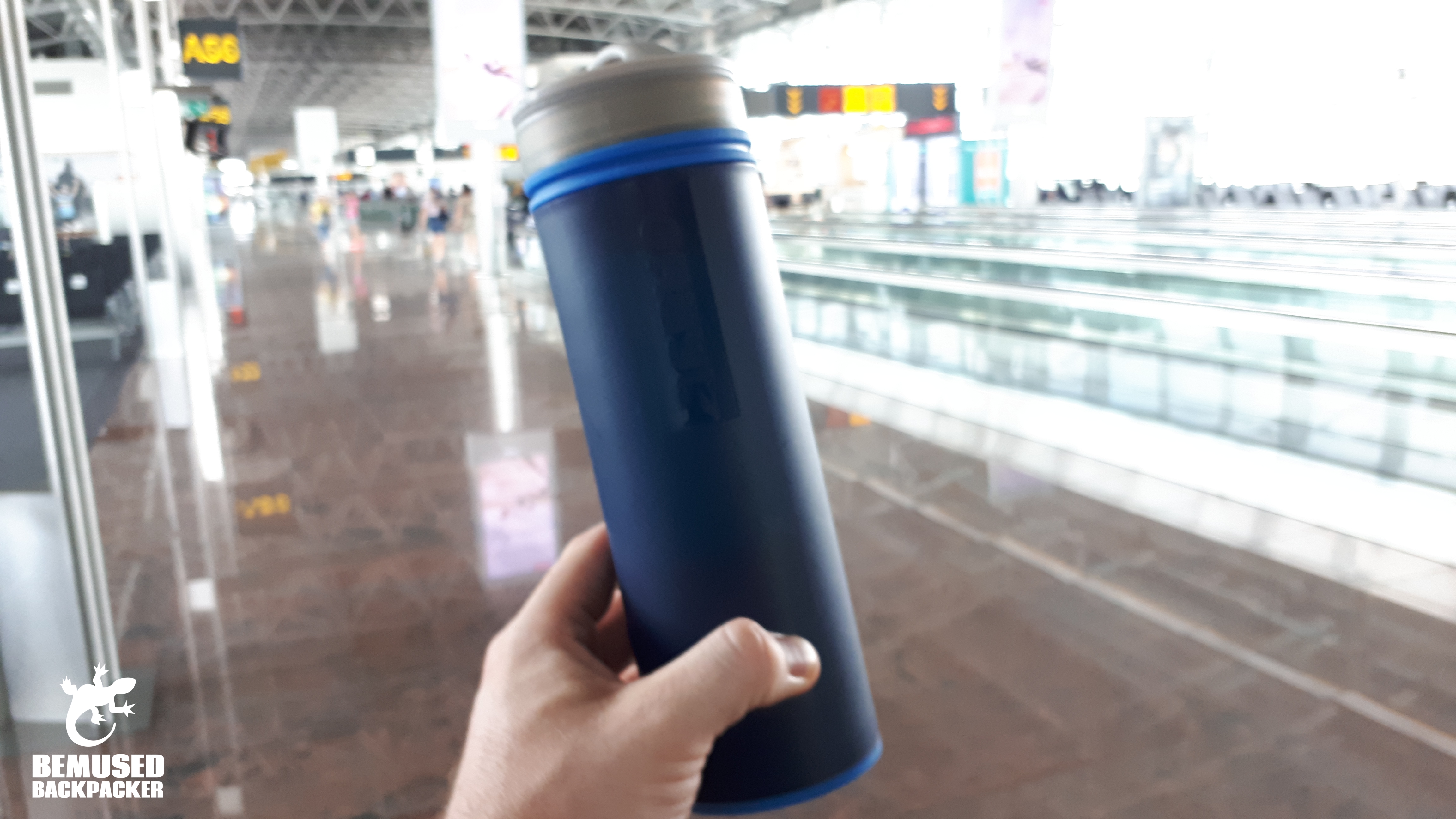 using GRAYL water bottle at an airport